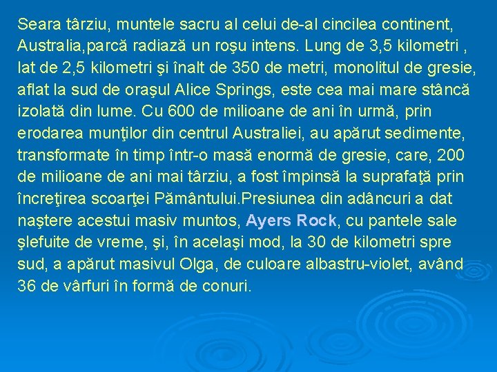 Seara târziu, muntele sacru al celui de-al cincilea continent, Australia, parcă radiază un roşu