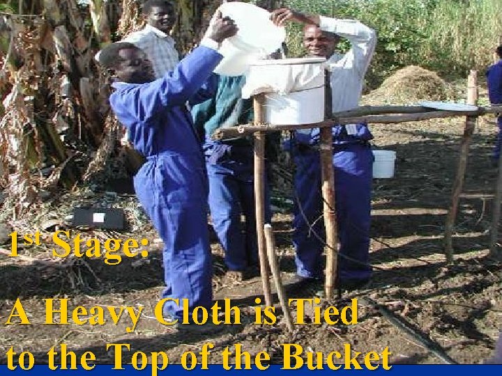 st 1 Stage: A Heavy Cloth is Tied to the Top of the Bucket