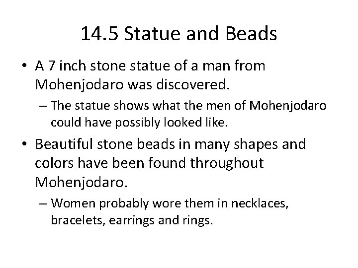 14. 5 Statue and Beads • A 7 inch stone statue of a man