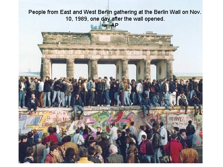 People from East and West Berlin gathering at the Berlin Wall on Nov. 10,