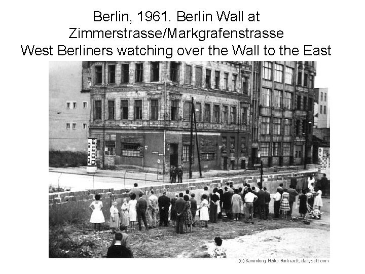 Berlin, 1961. Berlin Wall at Zimmerstrasse/Markgrafenstrasse West Berliners watching over the Wall to the