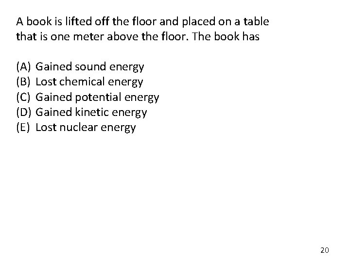 A book is lifted off the floor and placed on a table that is A book is lifted off the floor and placed on a table that is