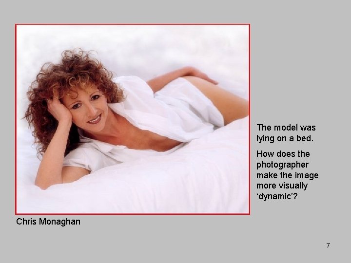 The model was lying on a bed. How does the photographer make the image