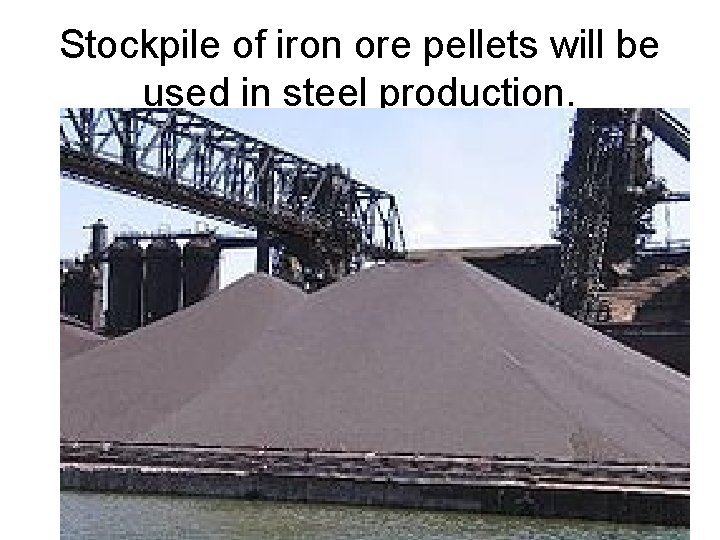 Stockpile of iron ore pellets will be used in steel production. 