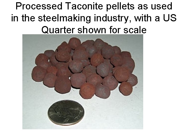 Processed Taconite pellets as used in the steelmaking industry, with a US Quarter shown