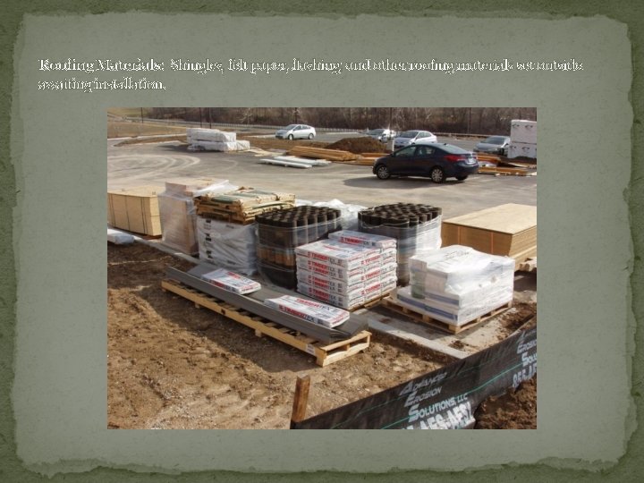 Roofing Materials: Shingles, felt paper, flashing, and other roofing materials set outside awaiting installation.