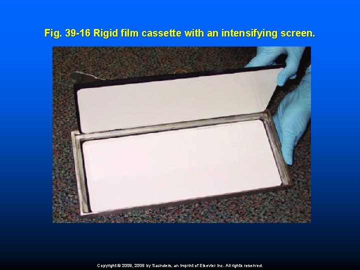 Fig. 39 -16 Rigid film cassette with an intensifying screen. Copyright © 2009, 2006