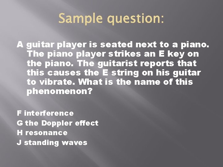 A guitar player is seated next to a piano. The piano player strikes an A guitar player is seated next to a piano. The piano player strikes an