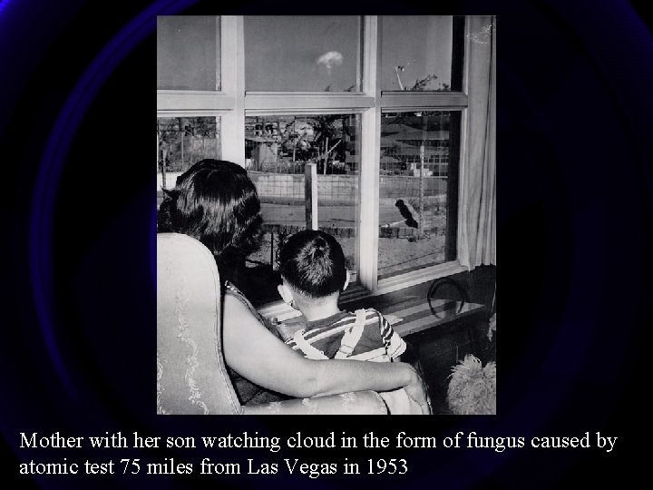 Mother with her son watching cloud in the form of fungus caused by atomic