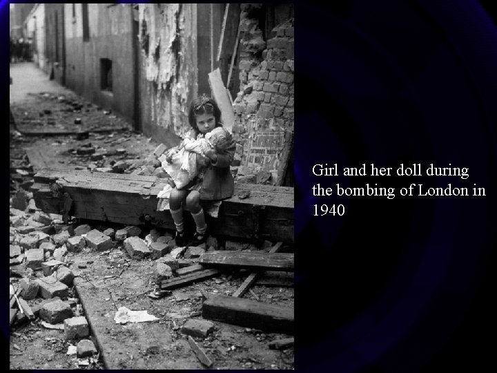 Girl and her doll during the bombing of London in 1940 