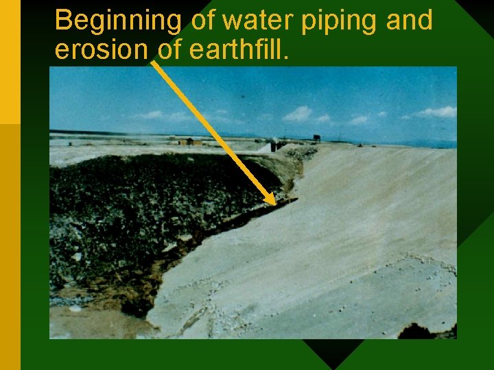 Beginning of water piping and erosion of earthfill. 