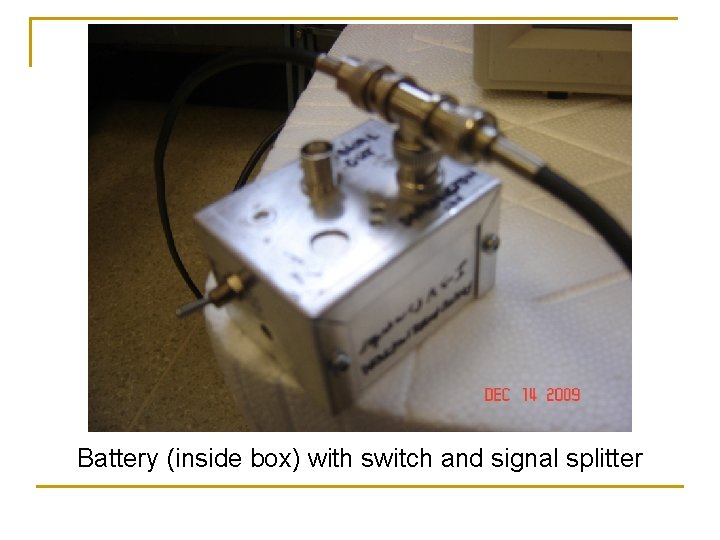 Battery (inside box) with switch and signal splitter 