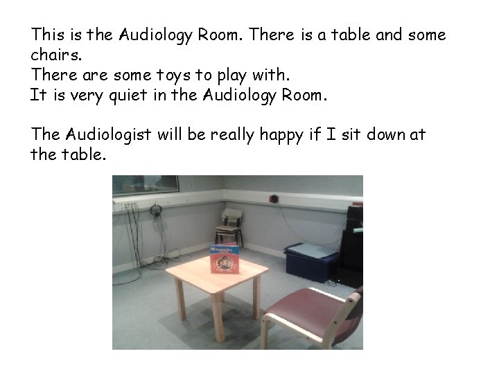 This is the Audiology Room. There is a table and some chairs. There are