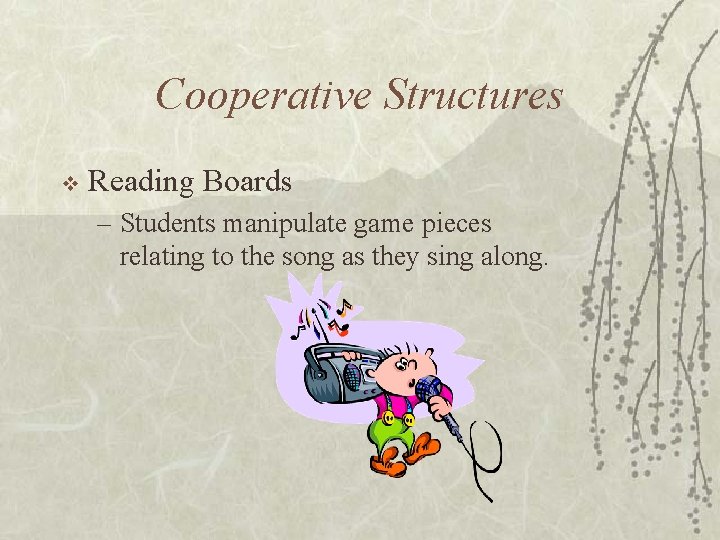 Cooperative Structures v Reading Boards – Students manipulate game pieces relating to the song