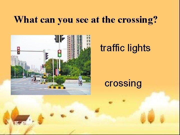 What can you see at the crossing? traffic lights crossing 