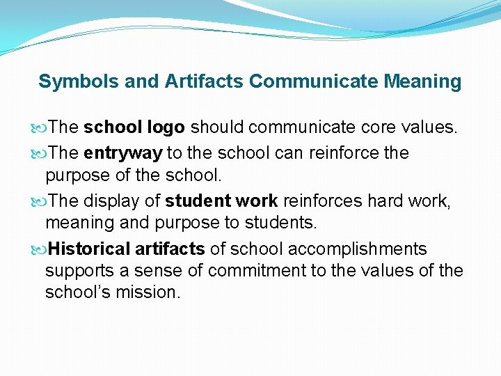 Symbols and Artifacts Communicate Meaning The school logo should communicate core values. The entryway