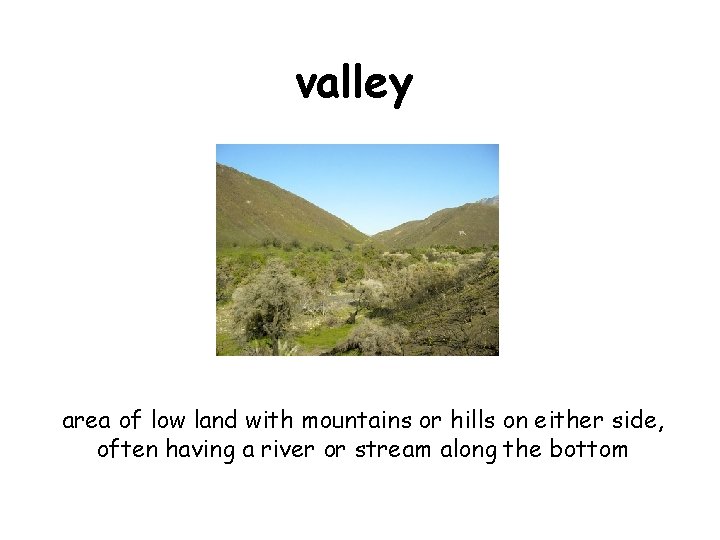 valley area of low land with mountains or hills on either side, often having