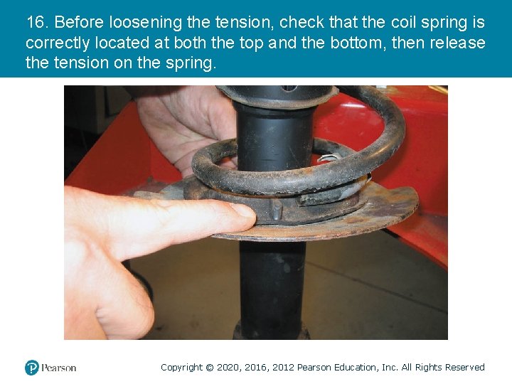 16. Before loosening the tension, check that the coil spring is correctly located at