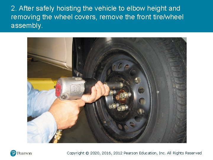 2. After safely hoisting the vehicle to elbow height and removing the wheel covers,