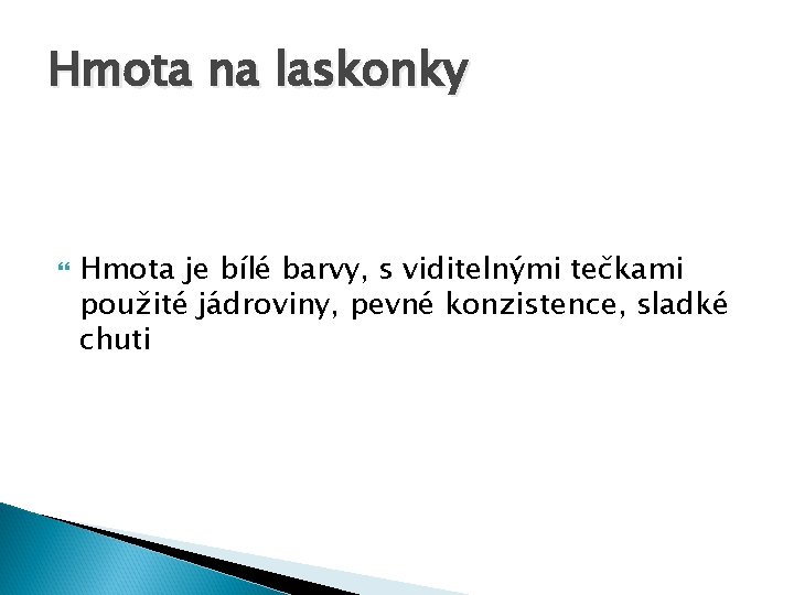 Hmota na laskonky Hmota je bílé barvy, s viditelnými tečkami použité jádroviny, pevné konzistence,