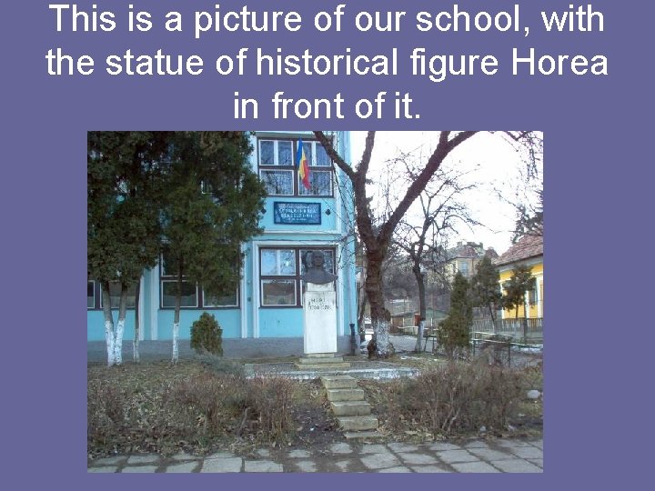 This is a picture of our school, with the statue of historical figure Horea