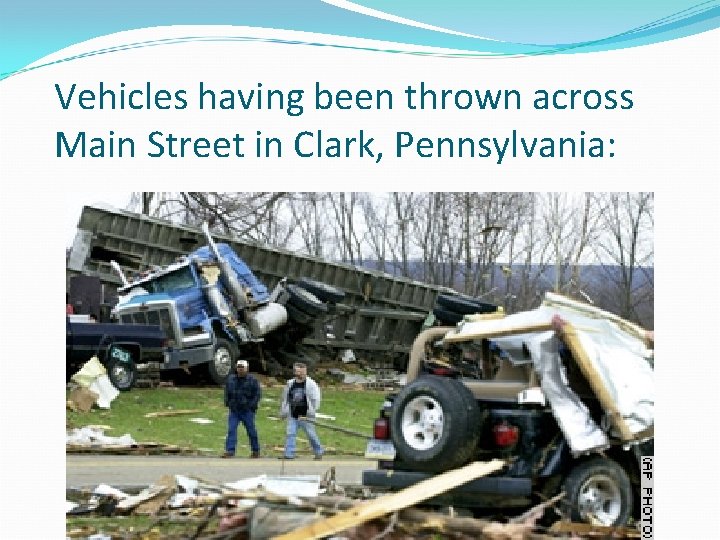 Vehicles having been thrown across Main Street in Clark, Pennsylvania: Vehicles having been thrown across Main Street in Clark, Pennsylvania: