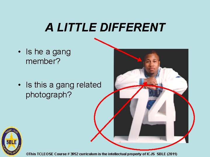 A LITTLE DIFFERENT • Is he a gang member? • Is this a gang