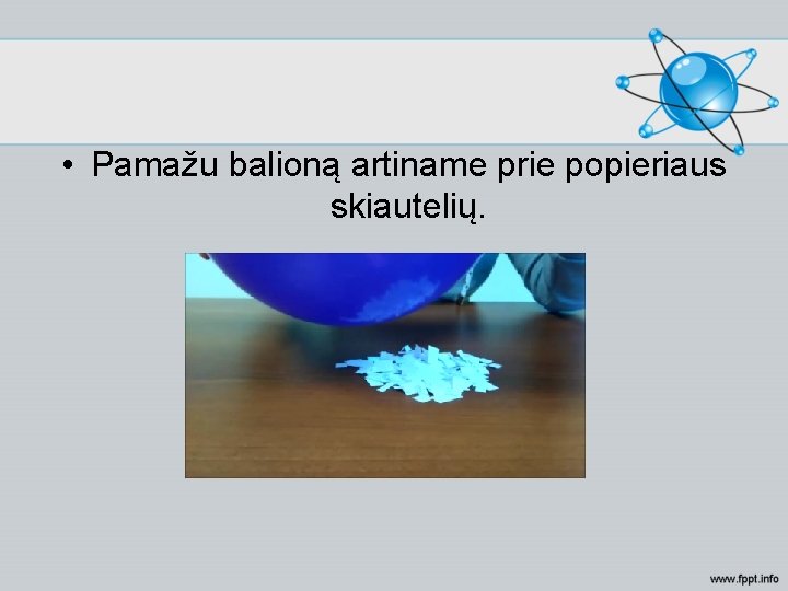  • Pamažu balioną artiname prie popieriaus skiautelių. 