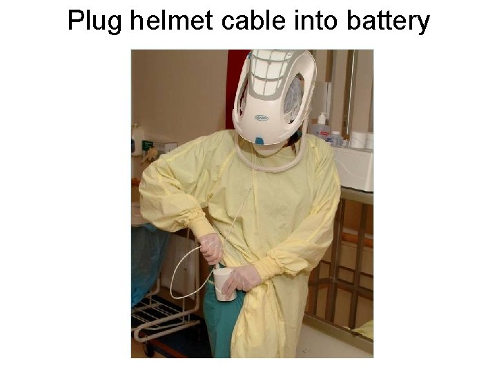 Plug helmet cable into battery 