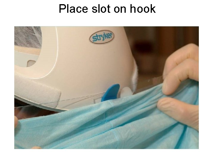 Place slot on hook 