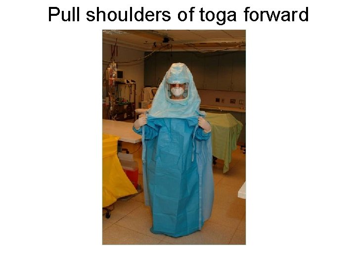 Pull shoulders of toga forward 