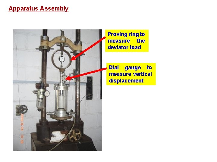 Apparatus Assembly Proving ring to measure the deviator load Dial gauge to measure vertical