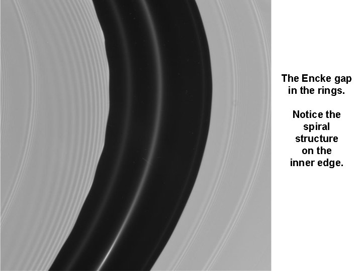 The Encke gap in the rings. Notice the spiral structure on the inner edge.