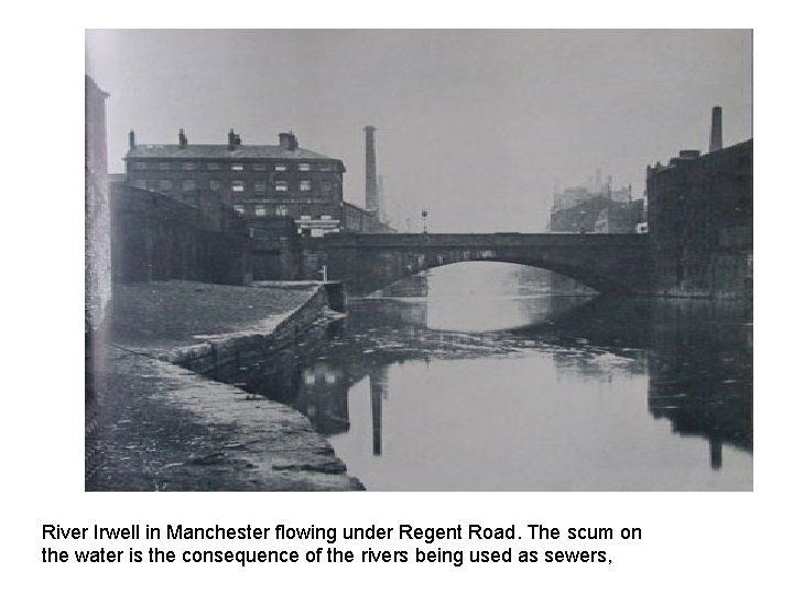 River Irwell in Manchester flowing under Regent Road. The scum on the water is