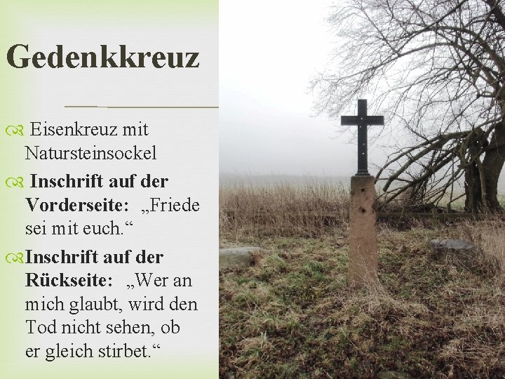 Gedenkkreuz Eisenkreuz mit Natursteinsockel Inschrift auf der Vorderseite: „Friede sei mit euch. “ Inschrift