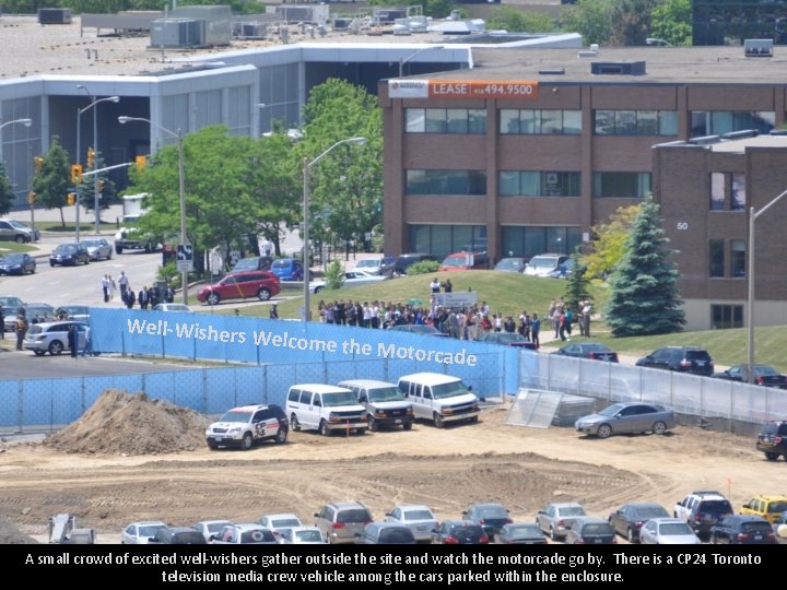 Well-Wishers Welcome the Motorcade A small crowd of excited well-wishers gather outside the site Well-Wishers Welcome the Motorcade A small crowd of excited well-wishers gather outside the site