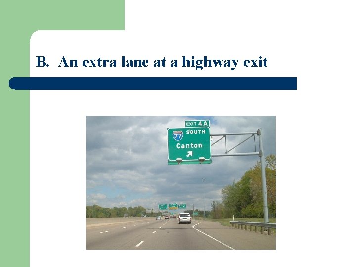 B. An extra lane at a highway exit 