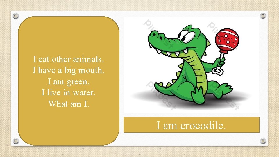 I eat other animals. I have a big mouth. I am green. I live