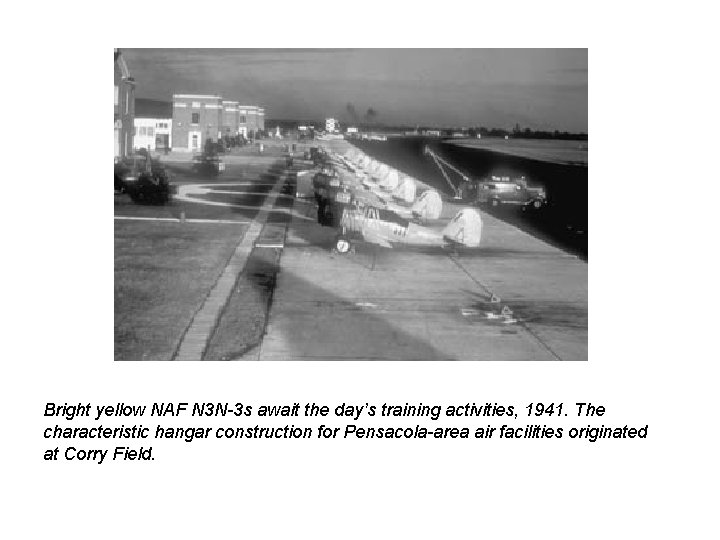 Bright yellow NAF N 3 N-3 s await the day’s training activities, 1941. The