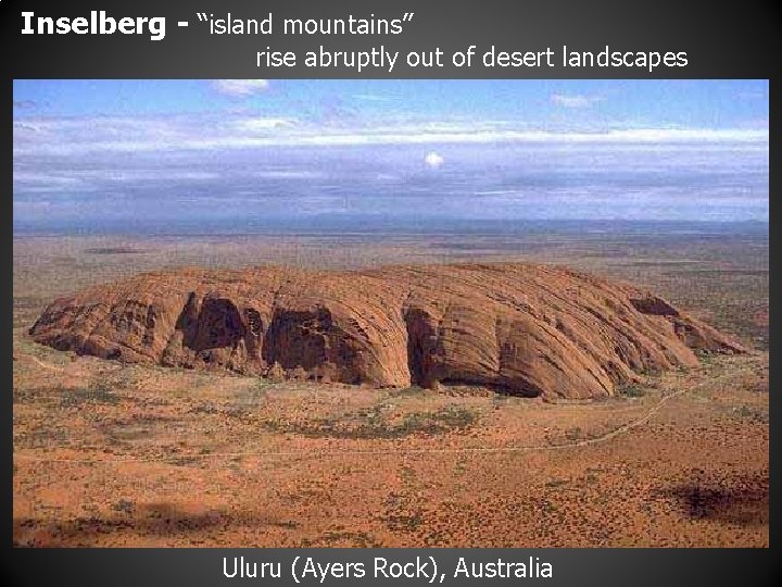 Inselberg - “island mountains” rise abruptly out of desert landscapes Uluru (Ayers Rock), Australia