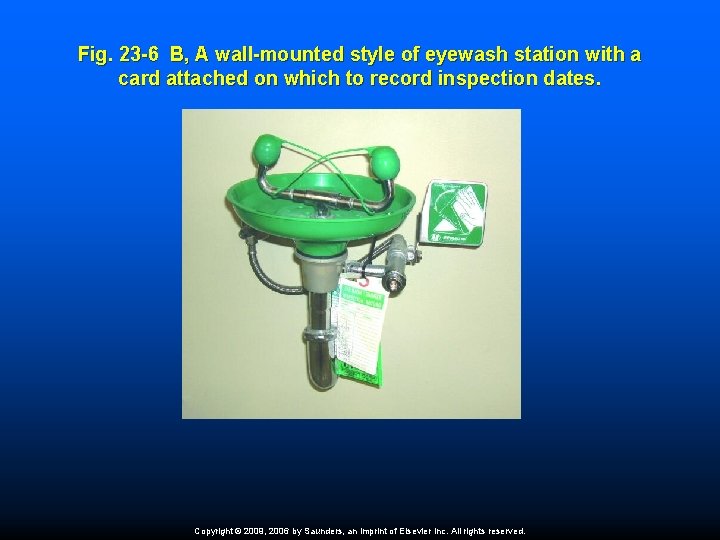 Fig. 23 -6 B, A wall-mounted style of eyewash station with a card attached