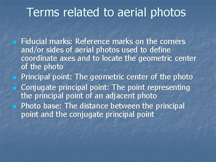 Terms related to aerial photos n n Fiducial marks: Reference marks on the corners