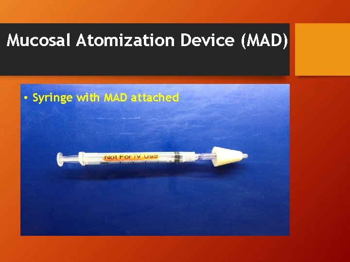 Mucosal Atomization Device (MAD) • Syringe with MAD attached Mucosal Atomization Device (MAD) • Syringe with MAD attached