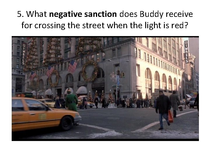 5. What negative sanction does Buddy receive for crossing the street when the light
