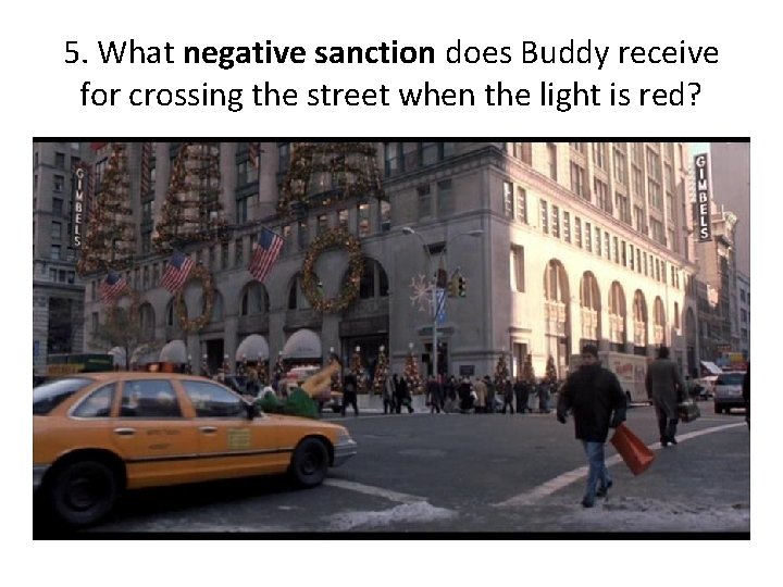 5. What negative sanction does Buddy receive for crossing the street when the light