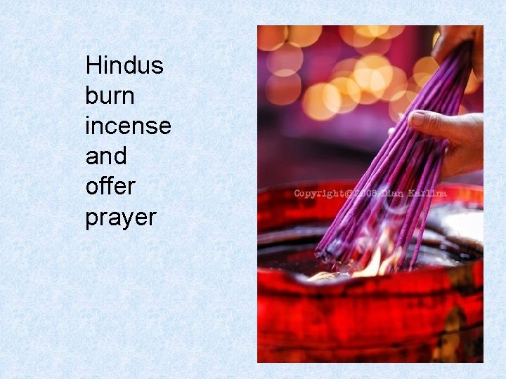 Hindus burn incense and offer prayer 
