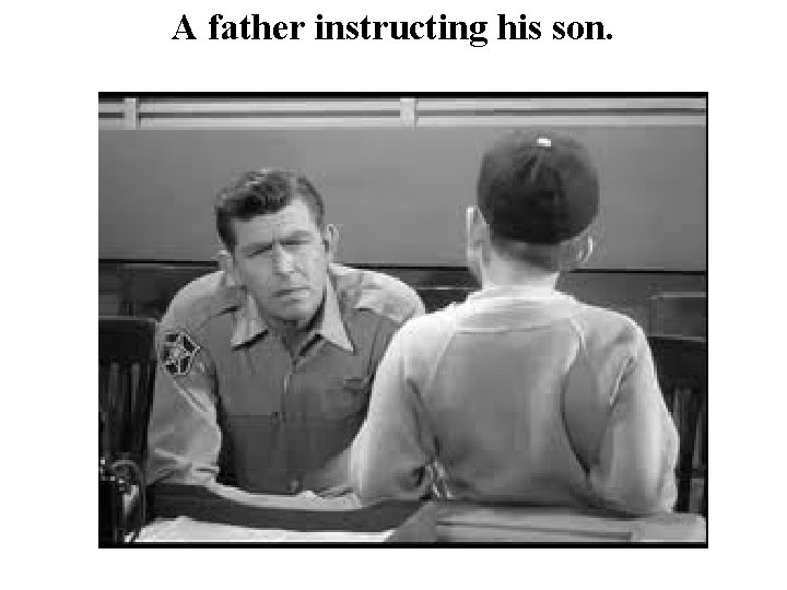A father instructing his son. A father instructing his son.