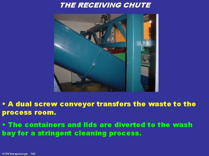 THE RECEIVING CHUTE • A dual screw conveyor transfers the waste to the process