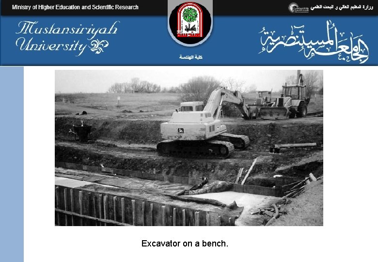 Excavator on a bench. 