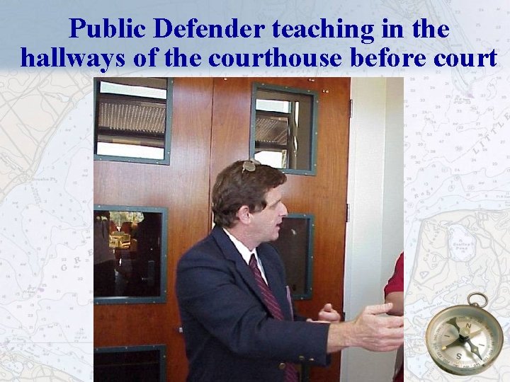 Public Defender teaching in the hallways of the courthouse before court 37 